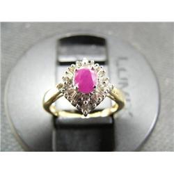 Ruby and diamond lady's ring, 14K yellow gold, ruby oval, faceted, approx. .75 carats, semi-transpar