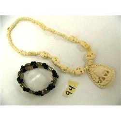 Carved Bone Necklace with13 Elephants and a silver and black bead bracelet (2)