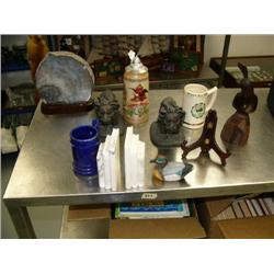 Lot of: 2 lion figurines, duck, 3 mugs, stein, wood quail carving, stone bookends, picture holder, a