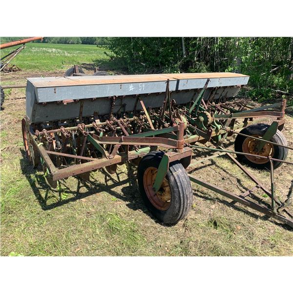 Old drill, grass attach. Steel packers, seed drill