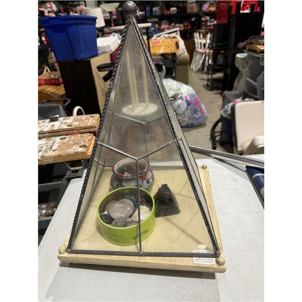 Pyramid stand with stones