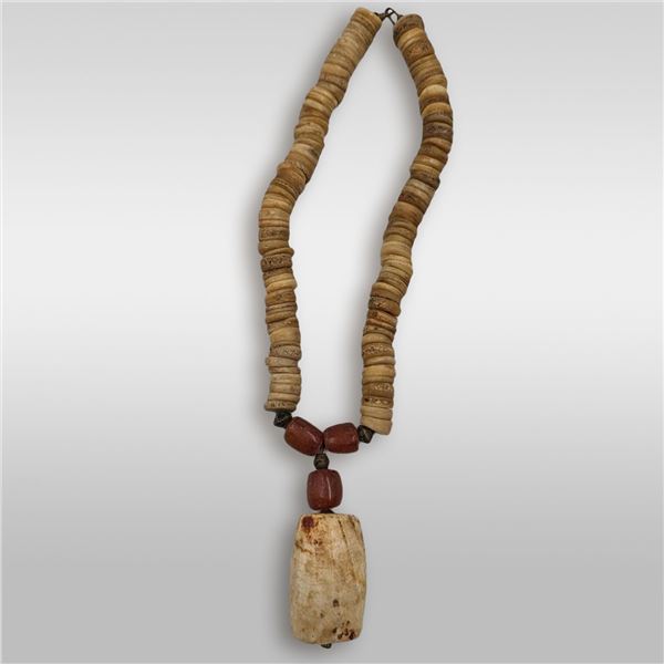 An Antique Carved Bone, Amber, And Brass Necklace, Likely Of African Origin
