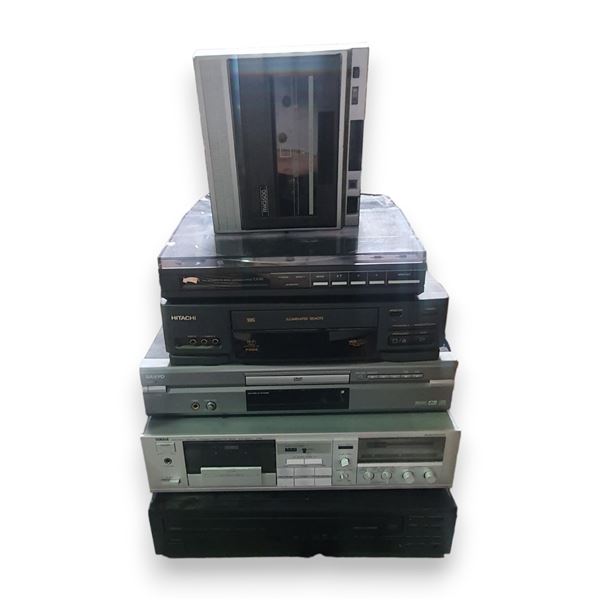 Above & under Table lot - x4 Misc DVD, VHS, Cassette Players, Record Player, VHS Rewinder - x2 Boxes