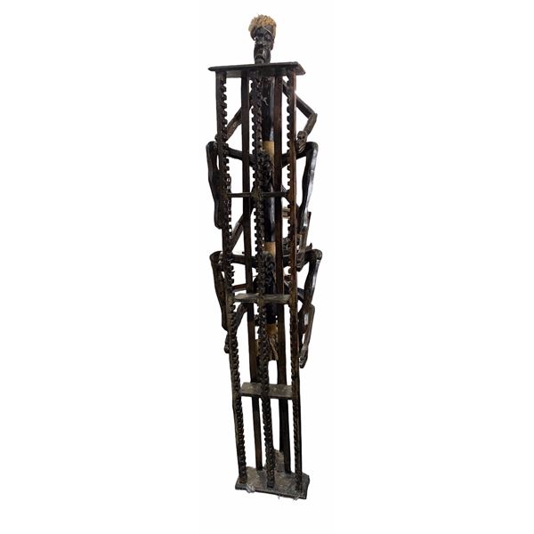 Hand carved African shelf unit, 83" high