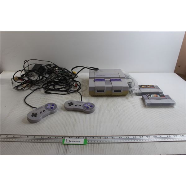 Super Nintendo Entertainment System, (2) Controllers, (2) Games, and Cords - Untested, As Is