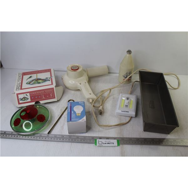 Hair Dryer (works - not well) - Empty Old Spice Bottle - Baking Pan - Humming Bird Feeder - Light-up