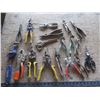 Image 1 : assorted pliers, snips, etc.