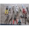 Image 2 : assorted pliers, snips, etc.