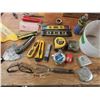 Image 1 : pail of assorted tapes , levels , knives