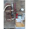 Image 1 : hydraulic safety switch , ratchet , pipe wrench , knee pads , dial indicator