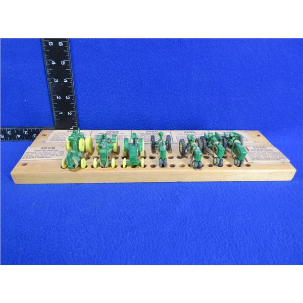 7 Miniature John Deere Tractors on Wood Display with Info