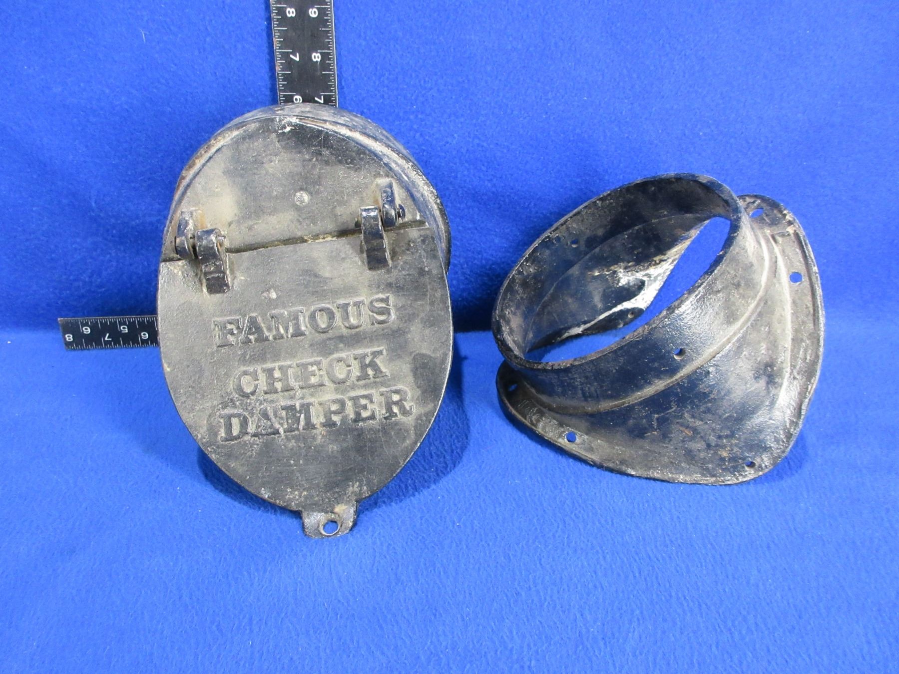 Vintage Cast Iron Famous Check Damper