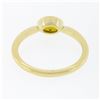 Image 6 : Simple Petite 14k Gold 0.70 ctw Bezel Oval Orange Yellow Sapphire Solitaire Ring