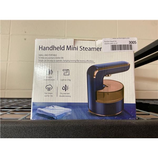 Handheld mini garment steamer