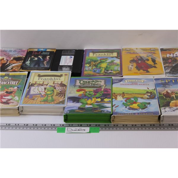 (11) VHS: Top Gun, Franklin, Mickey Mouse, Madeline, Spirit, Misc.