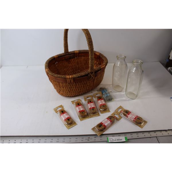 *Wicker Basket, (6) Leather Strings, (2) Glass Jugs