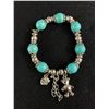Image 1 : Pretty Turquoise Bracelet with Teddy Bear and Elephant Charms