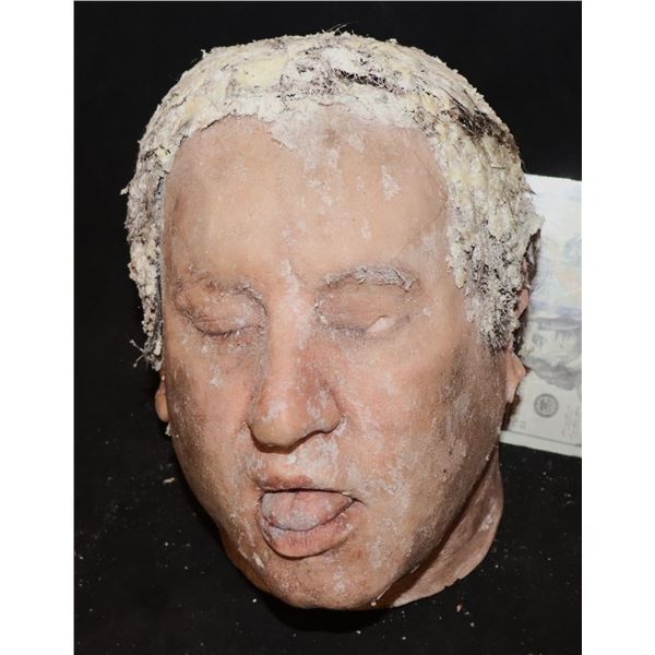 FROZEN SEVERED SILICONE HEAD COVERED IN ICE WITH OPEN MOUTH
