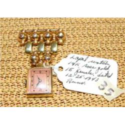 Lady's lapel watch 14K rose gold, 15 jewels date 1943 (74)