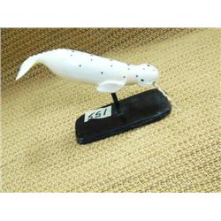 Ivory narwhale with inset baleen on baleen base with fossilized ivory horn, 3" tall  (2)