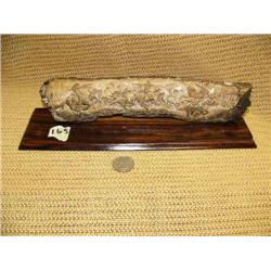 10" fossilized ivory relief carving of American Indians on horses on wood base - imported (2)