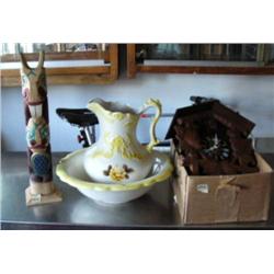 Lot of wood Alaska style totem, yellow and white water pitcher and bowl and wood coo coo clock (2)