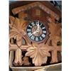 Image 5 : Lot of wood Alaska style totem, yellow and white water pitcher and bowl and wood coo coo clock (2)
