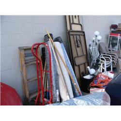 Lot of: Folding tables, lamps, extension cords, rugs, shovels/yard tools, wood ladder and hand truck