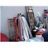 Image 1 : Lot of: Folding tables, lamps, extension cords, rugs, shovels/yard tools, wood ladder and hand truck
