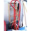 Image 2 : Lot of: Folding tables, lamps, extension cords, rugs, shovels/yard tools, wood ladder and hand truck