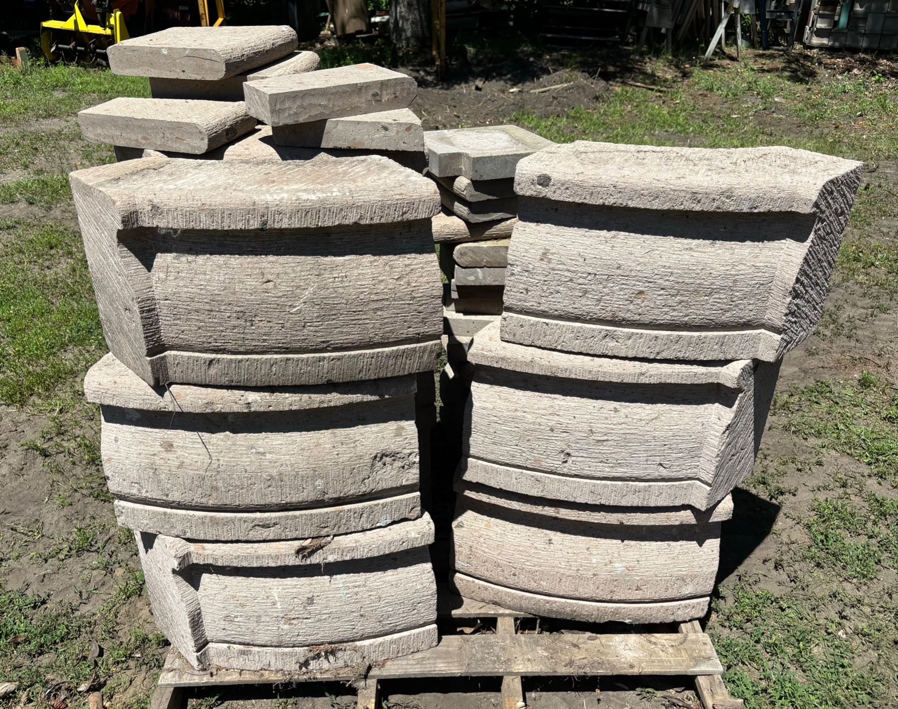 LARGE LOT OF CONCRETE RADIUS BLOCKS AND TOPPERS!