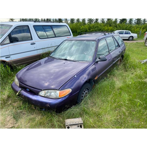Purple Ford station wagon, sold for parts (Buyer is Responsible to Load)