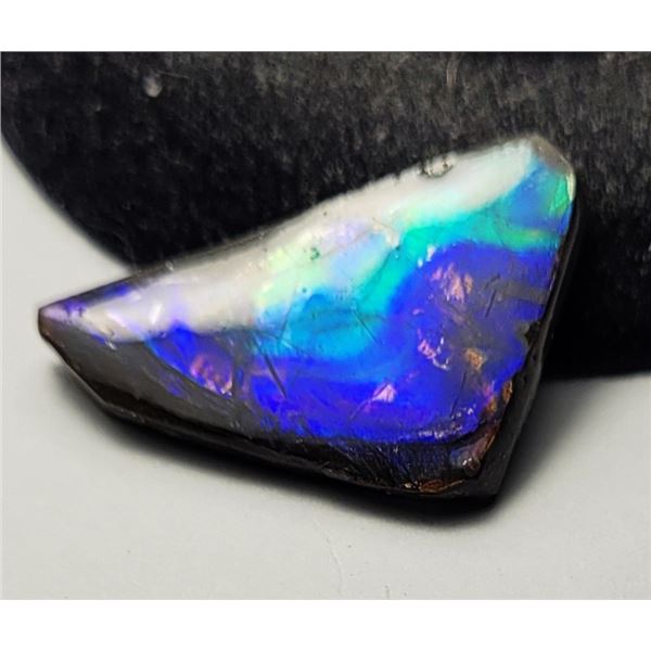 28)  NATURAL 9 CT BLUE FIRE TRIANGULAR SHAPED