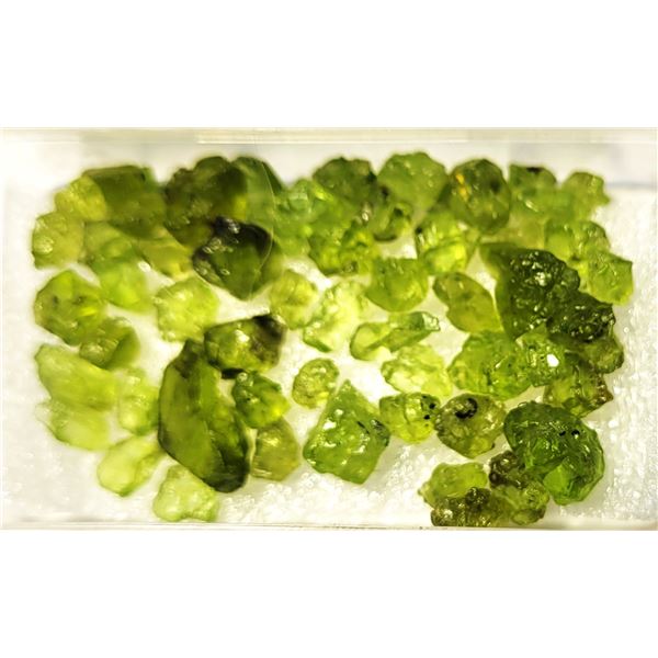 22)  LOT OF 55.9 CT OF ROUGH PERIDOT GEMSTONES.