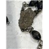 Image 4 : Black Wood Rosary Beads (link missing)