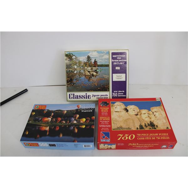 (3) Puzzles: Mt. Rushmore, Lake, Hot Air Balloons - as is