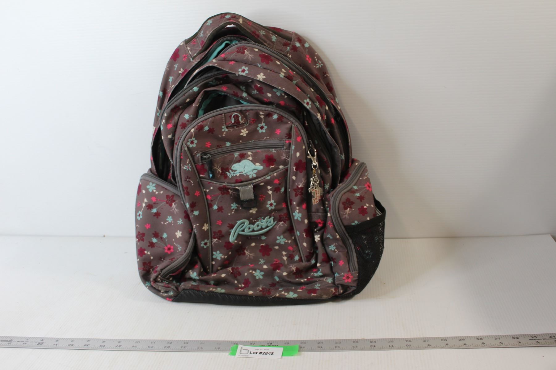 90s Roots Backpack Roots Backpack - Bodnarus Auctioneering