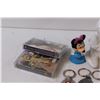 Image 2 : (2) Minnie Mouse Figurines, (2) Prince Cassette Tapes, Donald Duck Spoon, Micky Mouse Watch, Misc.