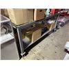 Image 1 : Glass Top Metal Framed Table on Wheels  PICK-UP LOCATION: 2635 LILLOOET STREET, VANCOUVER, BC. V5M 4