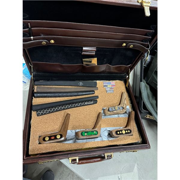 Golf items in briefcase