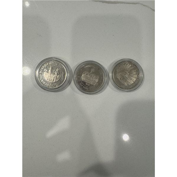 3x Canada native dollar tokens
