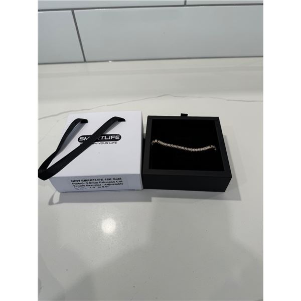 New smart life 18 K gold plated princess cut tennis bracelet adjustable 7 inches to 8 inches