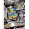 Image 4 : Tin with Pokemon Cards