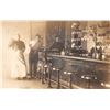 Image 1 : Real Photo People Gathered at Soda Counter Interior Postcard