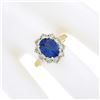 Image 3 : NEW 14k Yellow Gold 2.86 ctw Oval Violet Blue Tanzanite Round Diamond Halo Ring