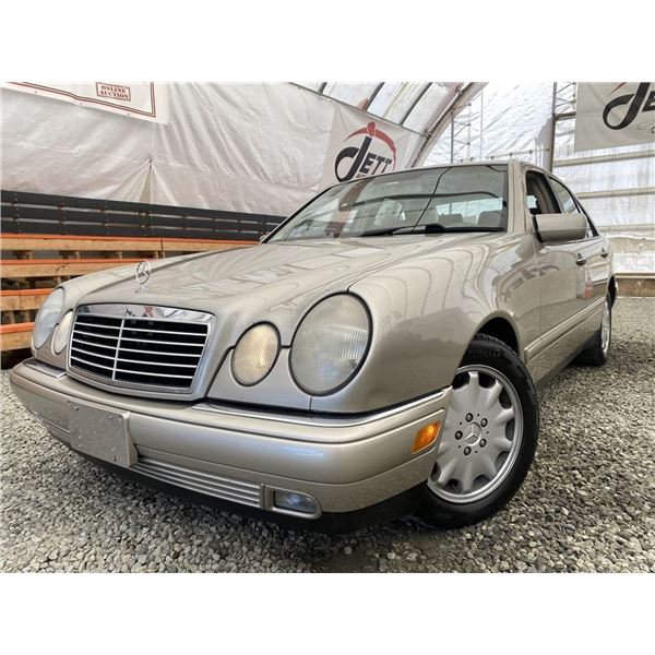 A12D --  1999 MERCEDES E320 GOLD 179603 KMS