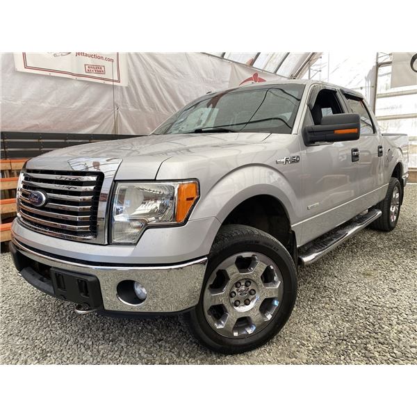 F2 --  2011 FORD F150 SILVER 292056 KMS