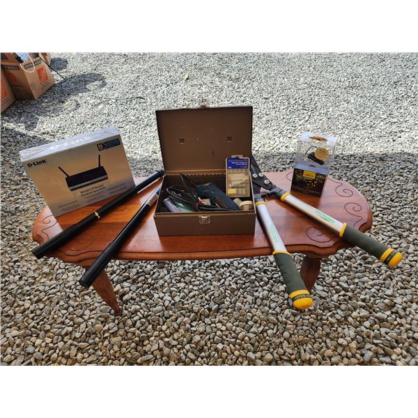 689 - WiFi router, Pruning Sheers, Dremel, and Bluetooth Head Set.