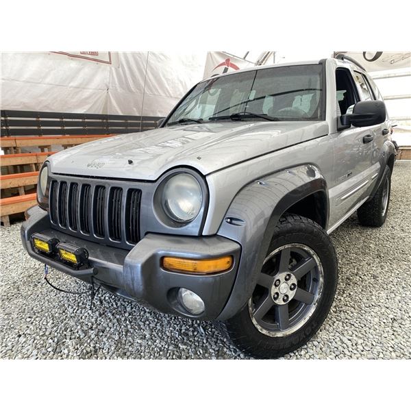 A8 --  2003 JEEP LIBERTY SILVER 275988 KMS