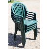 Image 1 : 4 GREEN PLASTIC STACKABLE PATIO CHAIRS